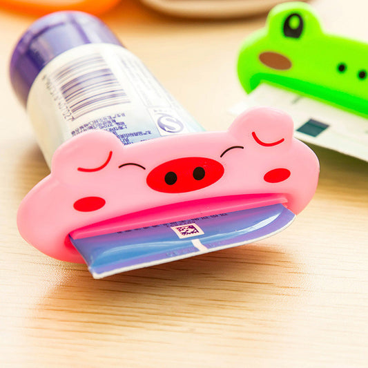 Free Shipping 2pcs/lot High Quality Cute Household Bathroom Creative Cartoon Plastic Cream Cleanser Toothpaste Squeezer